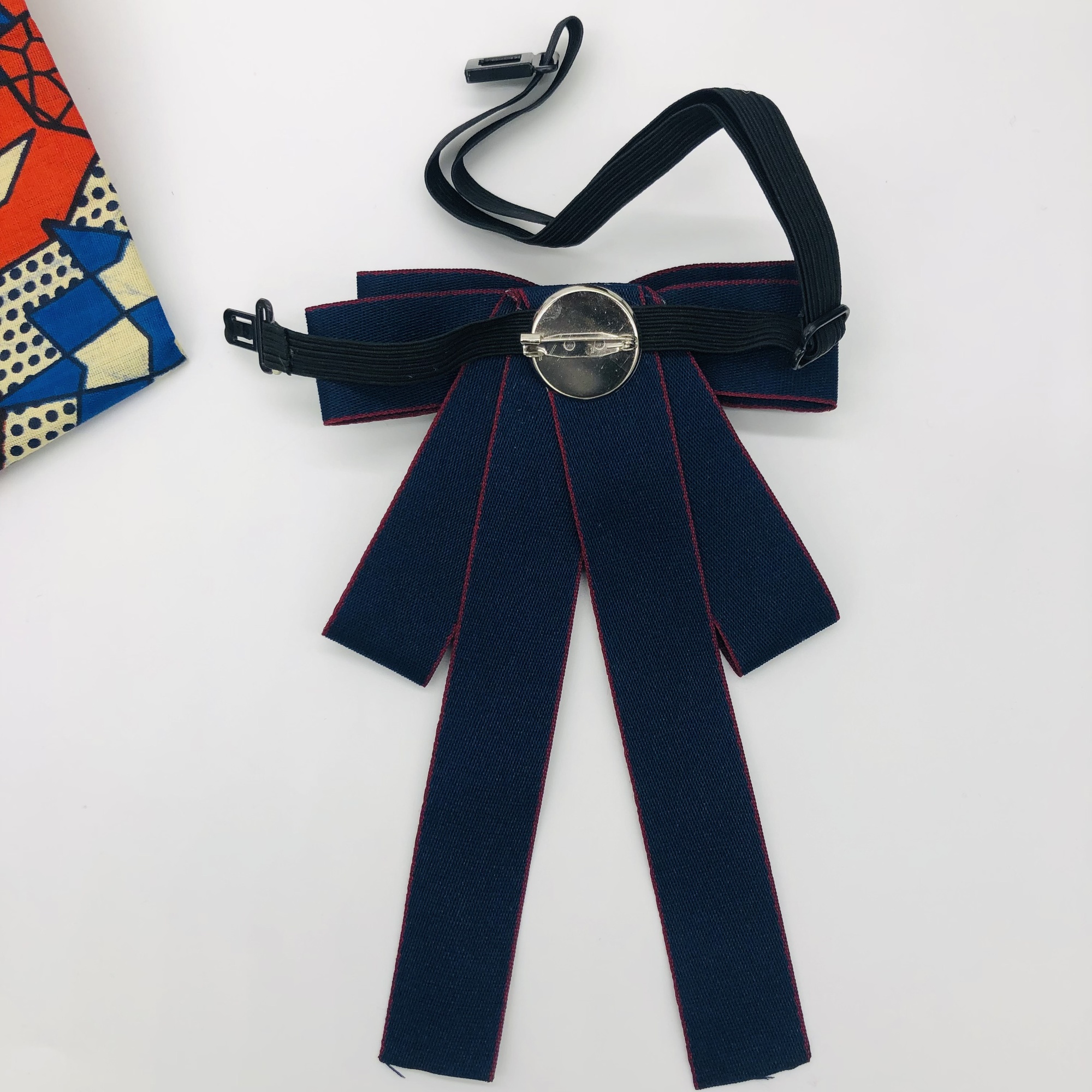 Jabot style bow tie with Wofiira Brooch - Blue with red trim - Image 7