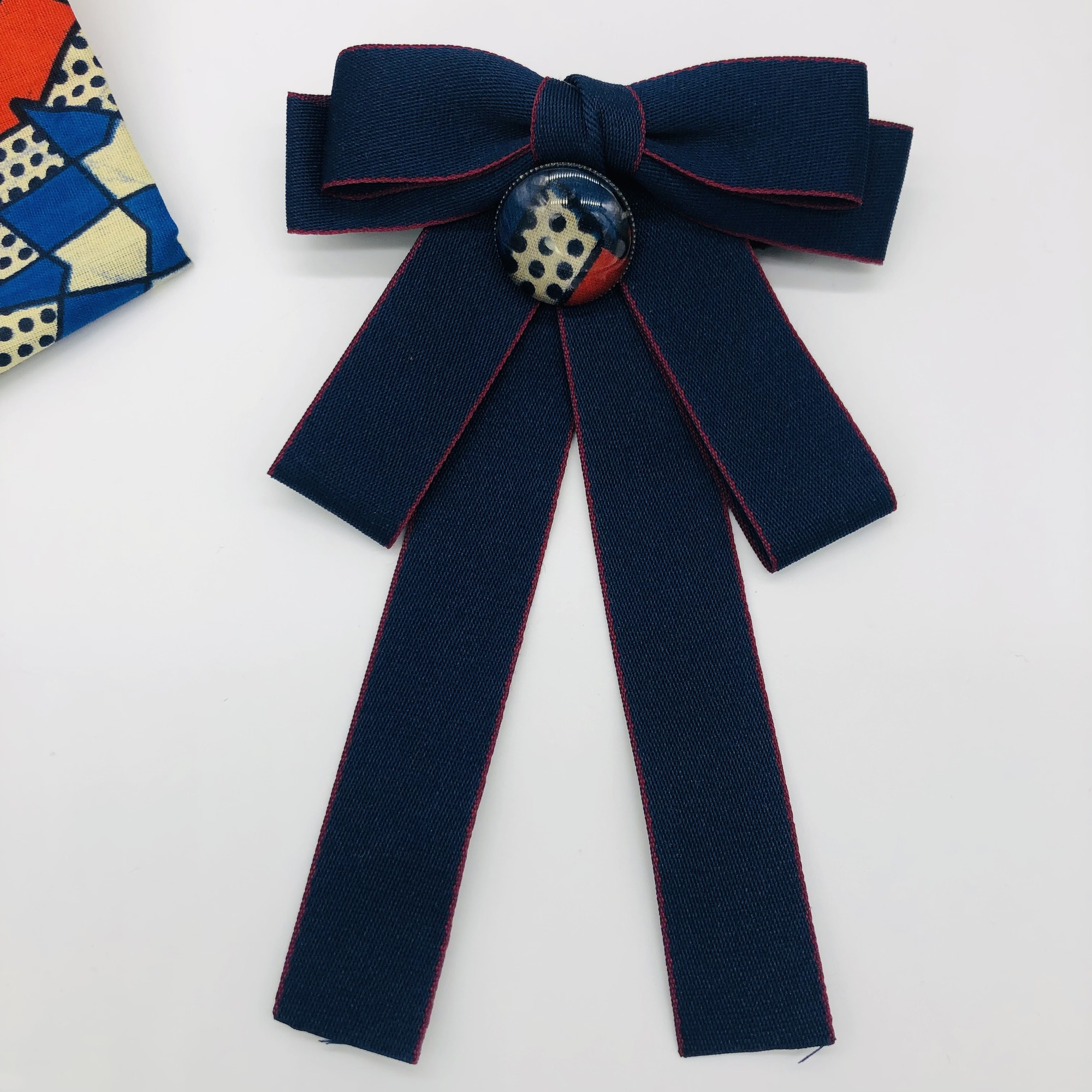 Jabot style bow tie with Wofiira Brooch - Blue with red trim - Image 5
