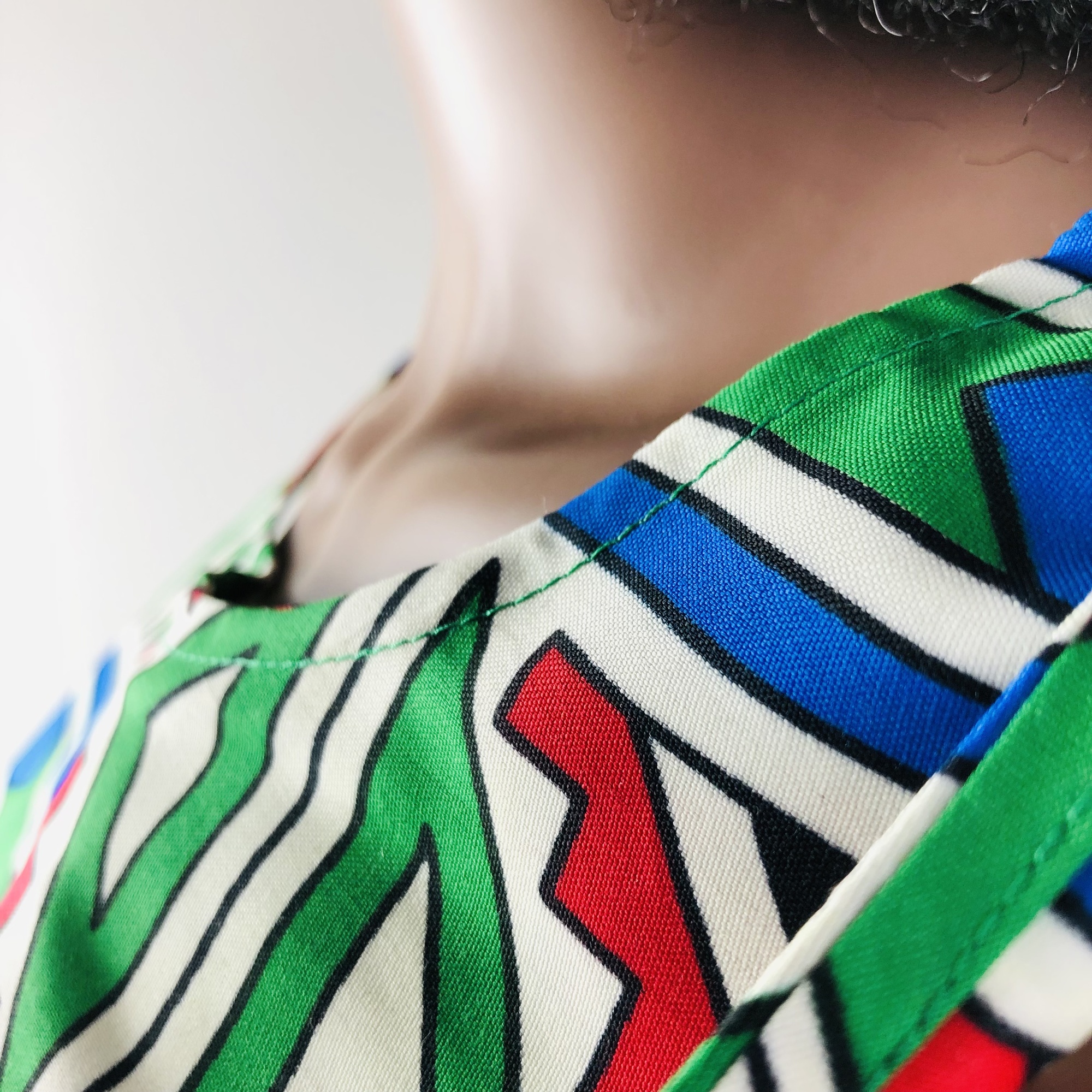 Ndebele Print Green Sleeveless Top -Back Neckline slit fastener - Image 6