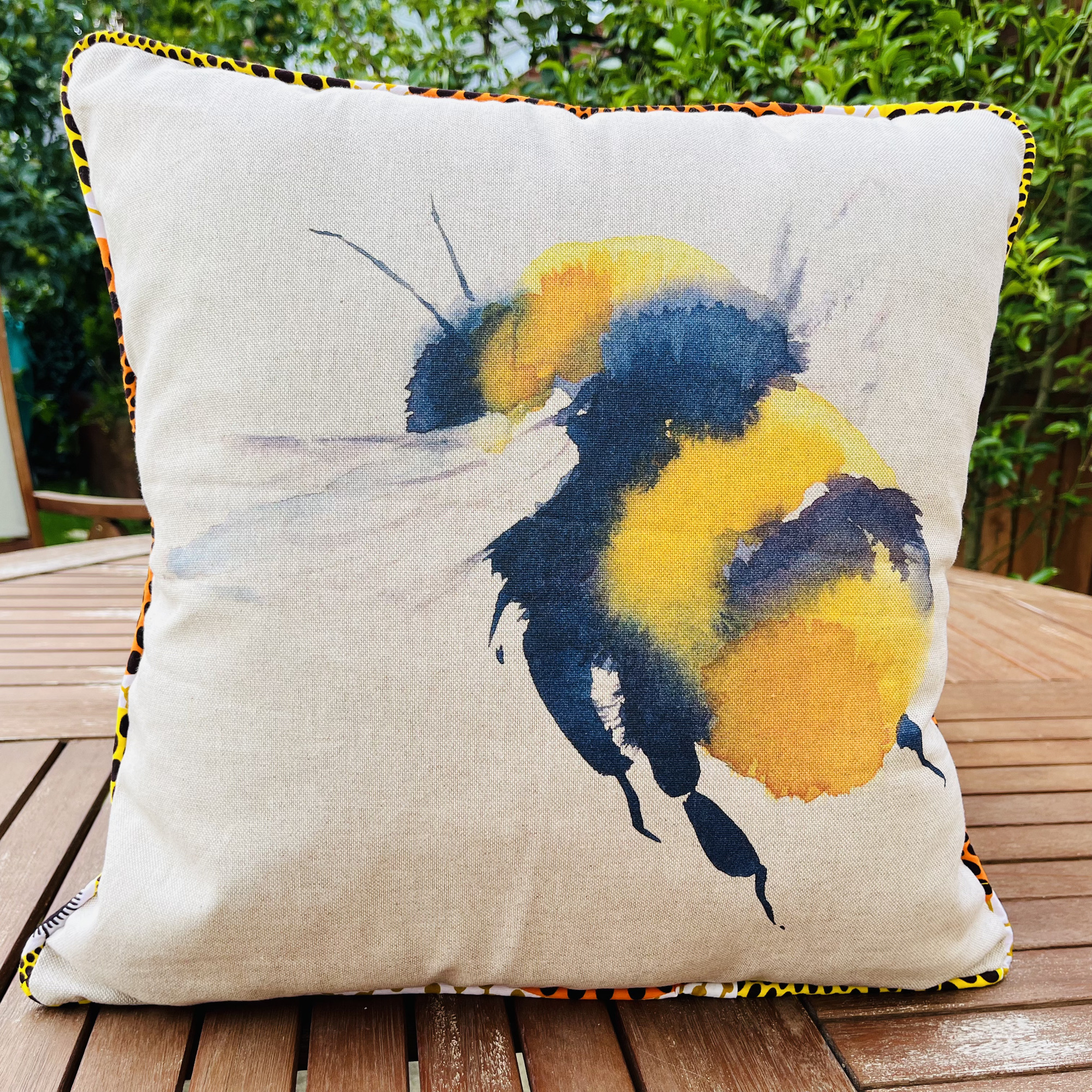 Nyuchi Bee on African Print Nsu Bura Ankara Tribal Ethnic Colourful Cushion - Image 3
